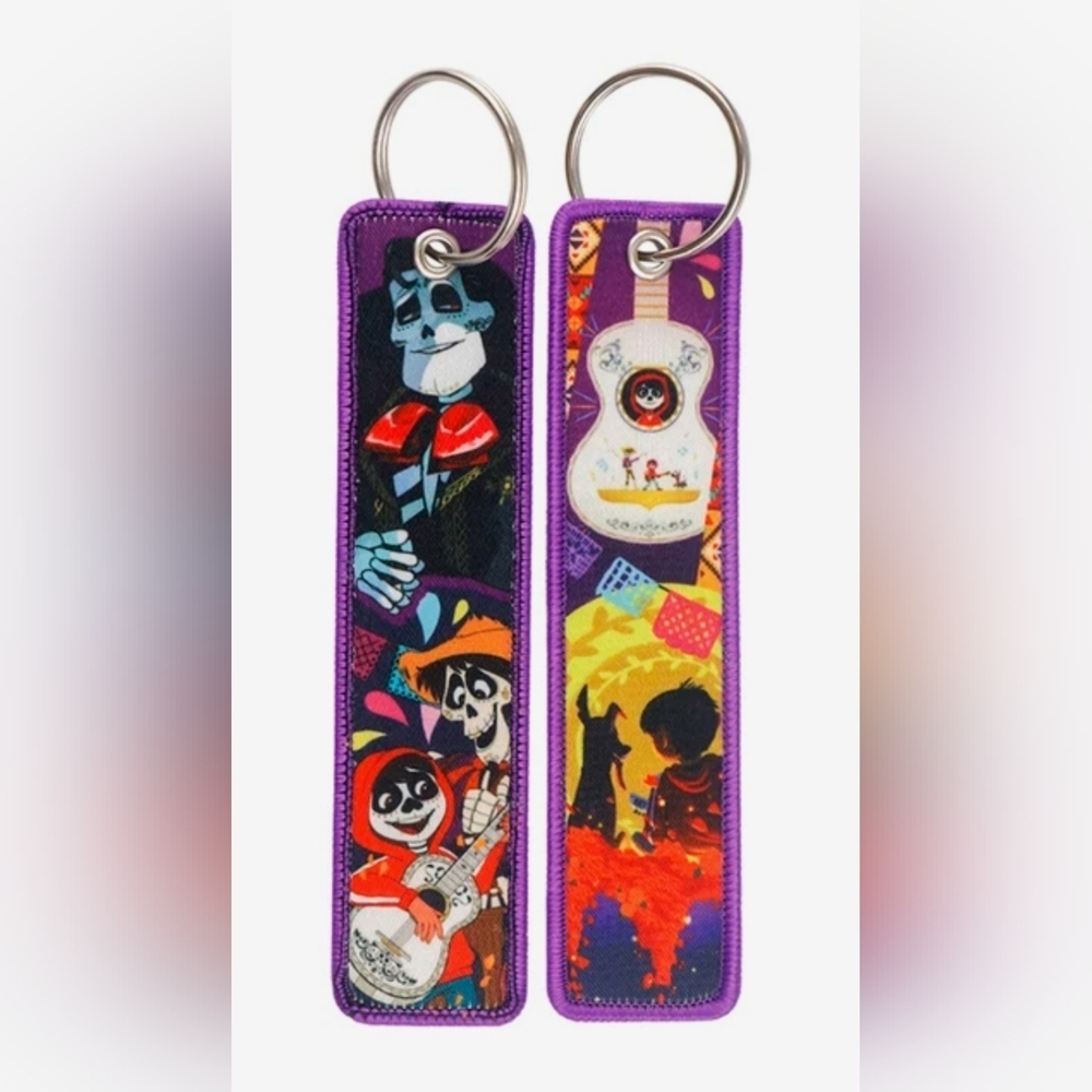 - Disney Coco Purple Keychain / Motorcycle Jet Tag